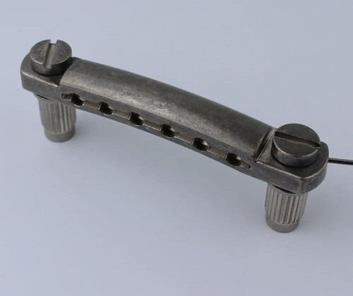 Aged silver guitar stop - aged,